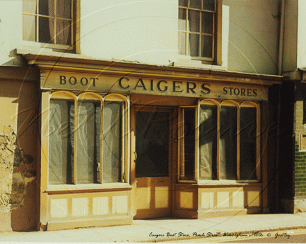 Caigers Boot Store in Peach Street, Wokingham c1980s before it was demolished and replaced by another Charity Shop.  Photograhers: Ken & Edna Goatley