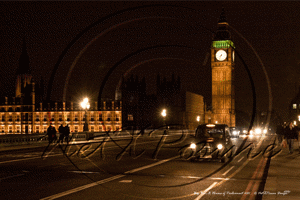 Westminster Bridge & Big Ben (St Stephen's Tower) with a London Black Cab fast approaching in London January 2011