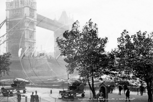 Tower Bridge with The Tower of London Cannons in London c1900s