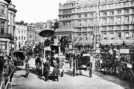 Charing Cross and The Strand with horse-drawn traffic containing Hansom Cabs and Growler Cabs in London c1890s