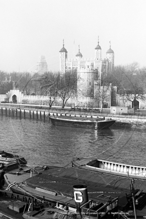 Tower of London from The Thames with barges in London c1961