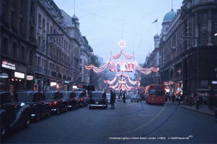 Christmas lights, Oxford Street with Taxi Cabs and Buses in Central London c1960s